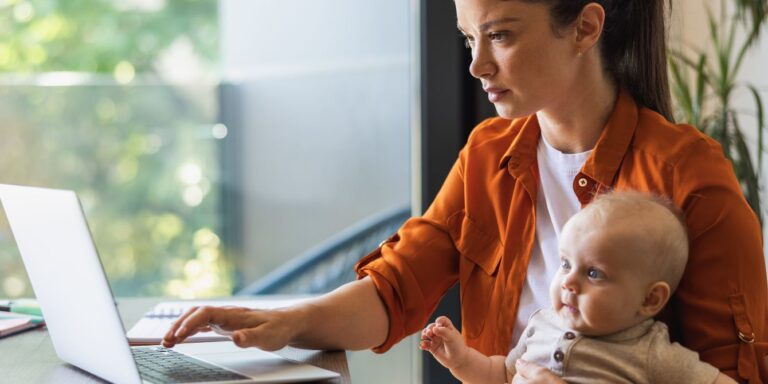 mother working with baby fmla for ppd