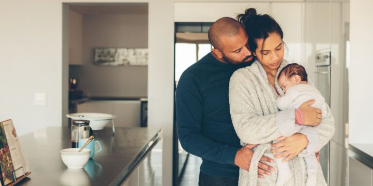 parents in kitchen with newborn postpartum depletion