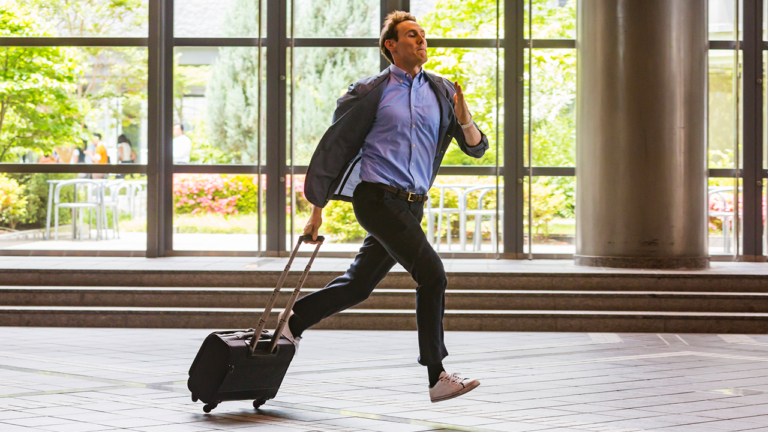 flight passenger rushing through airport