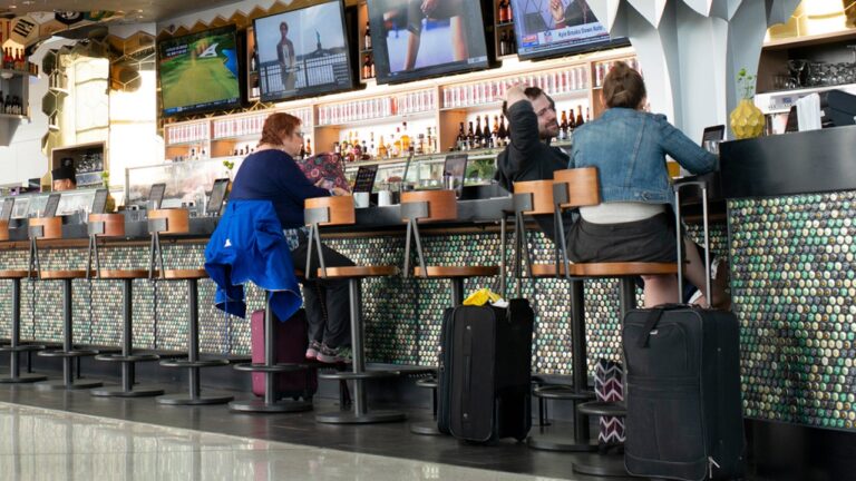 flight passengers drinking airport